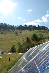 solar panels with mountain in background