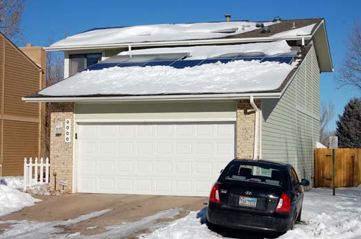 A dozen tips for getting snow off solar panels