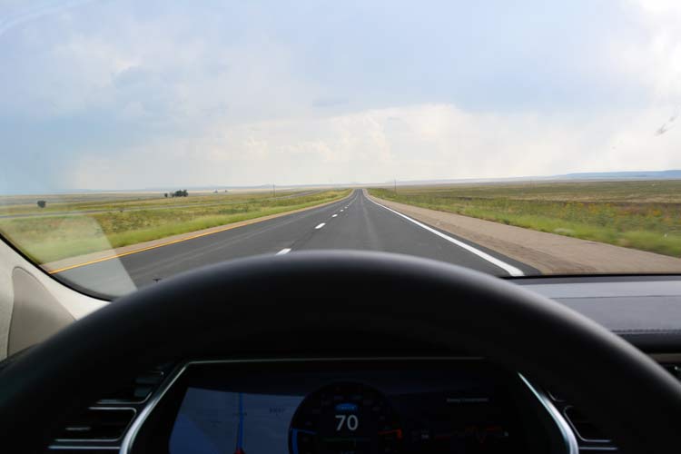 No other cars -- or gas stations -- on this lonely section of I-25 in Northern Mexico, but plenty of confidence that I wouldn't run out of charge in my brother's Tesla Model S. [Photo by Christof Demont-Heinrich]