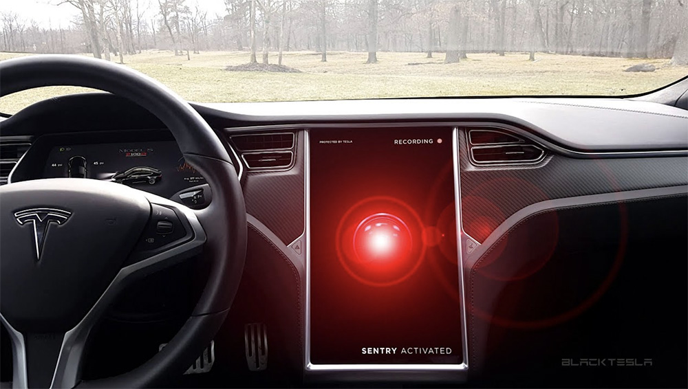 Picture of Tesla dashboard with Tesla Sentry Mode on