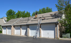 Sopris solar worker on garage roof